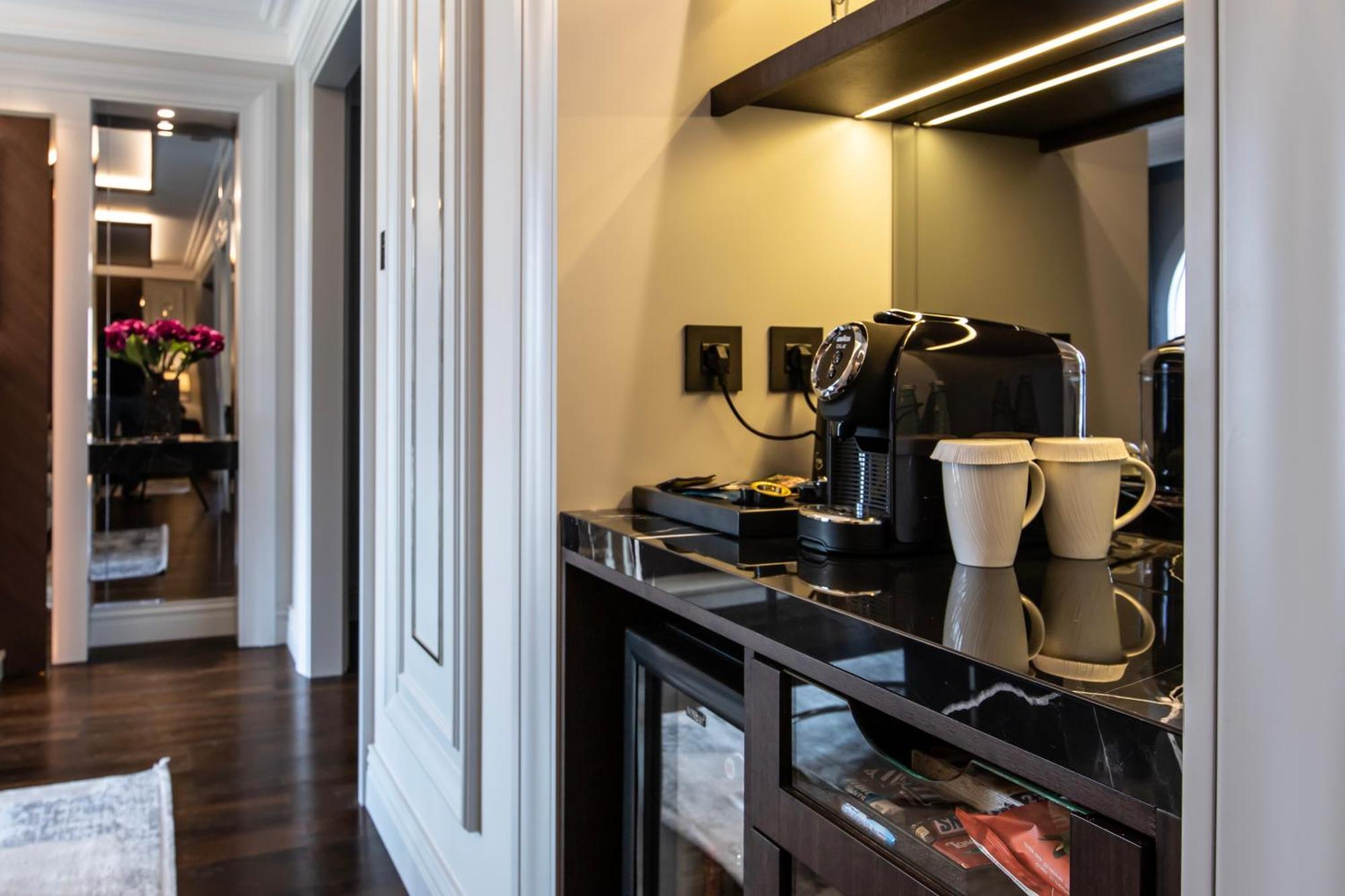 Xheko Imperial Luxury Hotel & Spa Tirana Kültér fotó A Nespresso machine in a hotel room