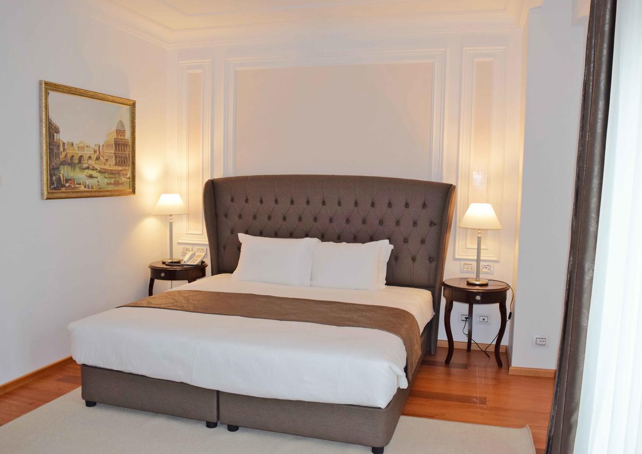 Xheko Imperial Luxury Hotel & Spa Tirana Kültér fotó A bedroom at the hotel
